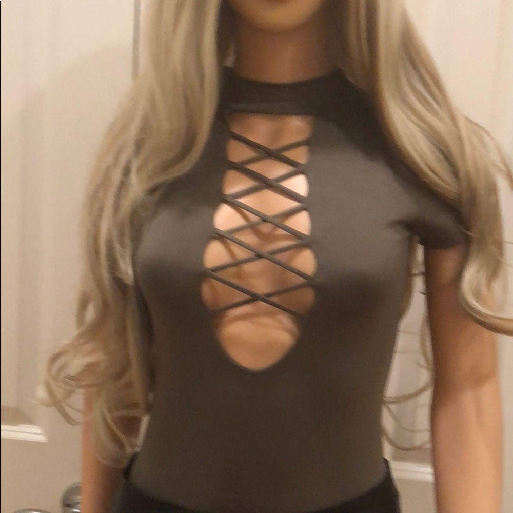 Dark green body suit or brown